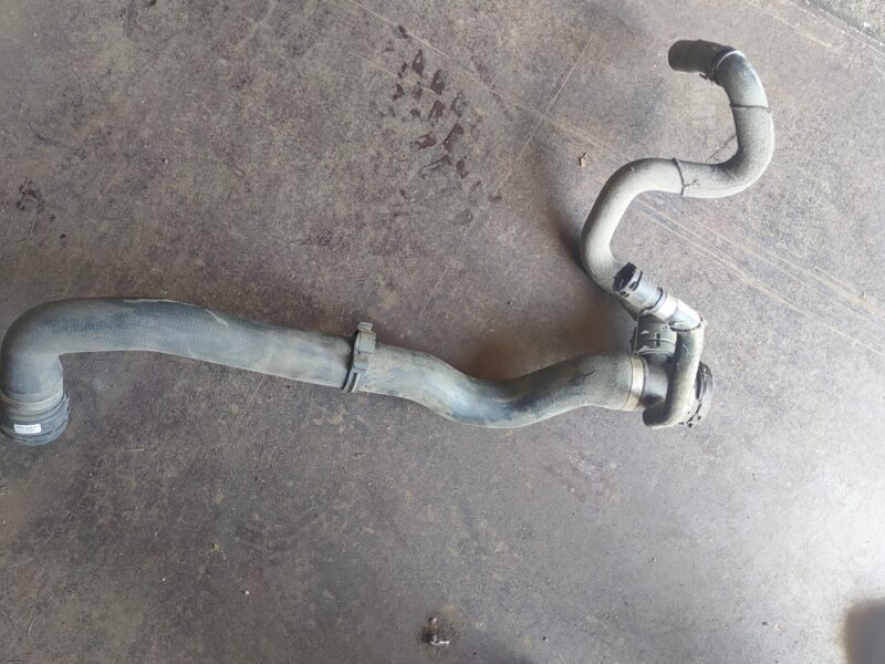 BMW kruciec z przewodami od chłodnicy ori 17128513603